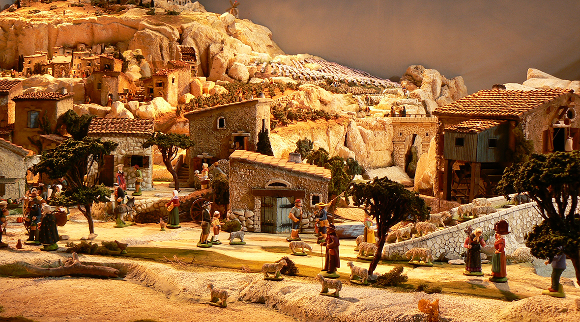 Toy village scene made from small figures